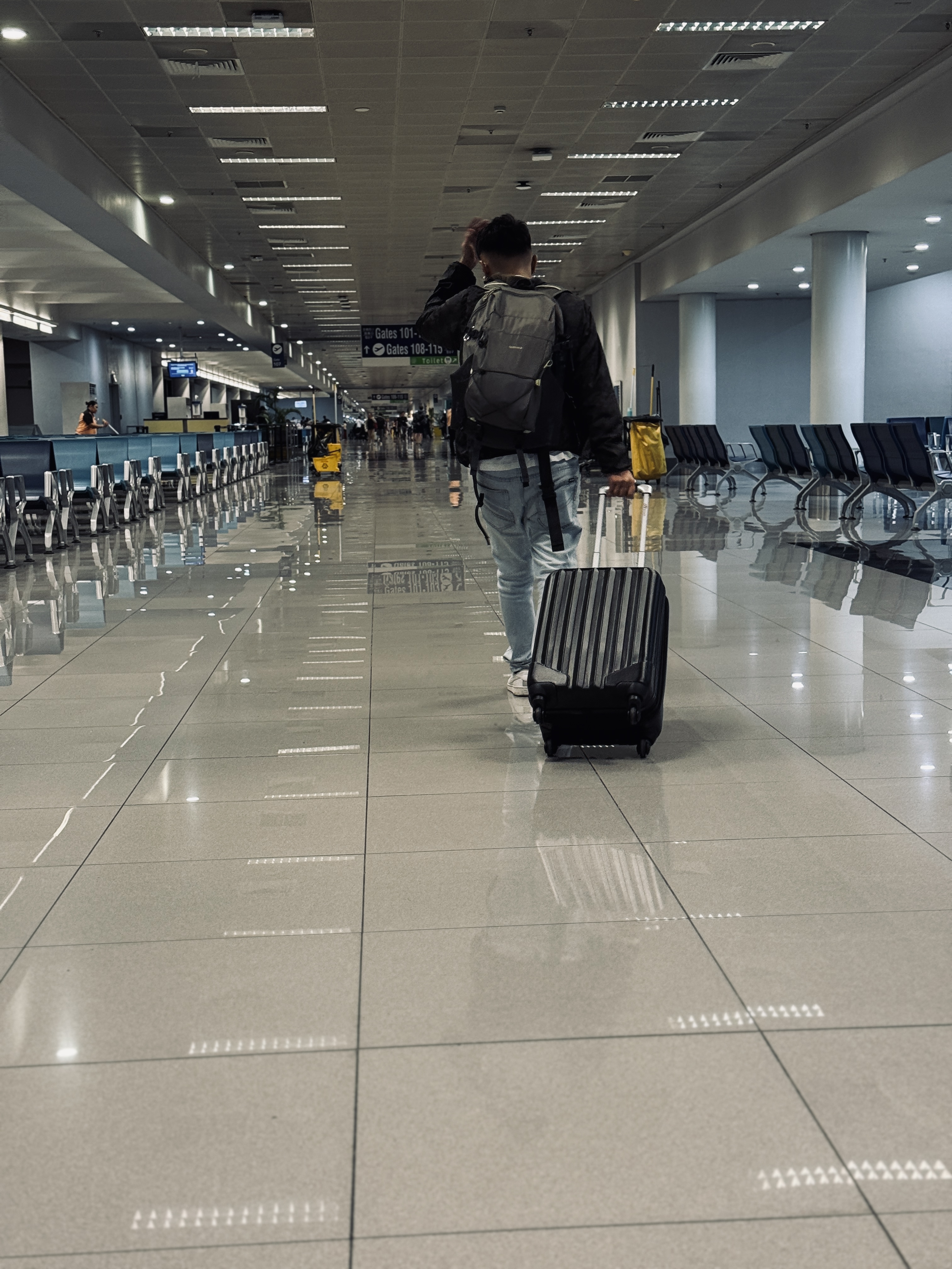 Dylan walking through an airport terminal — every journey starts here